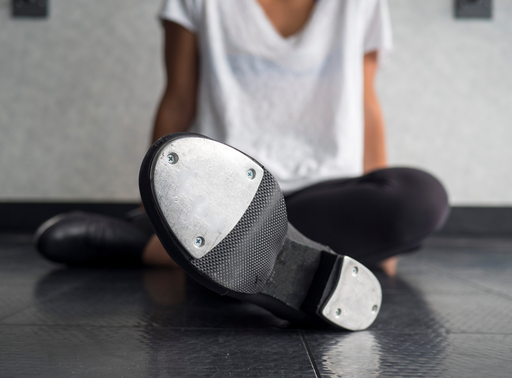 tap dancer relaxing in class